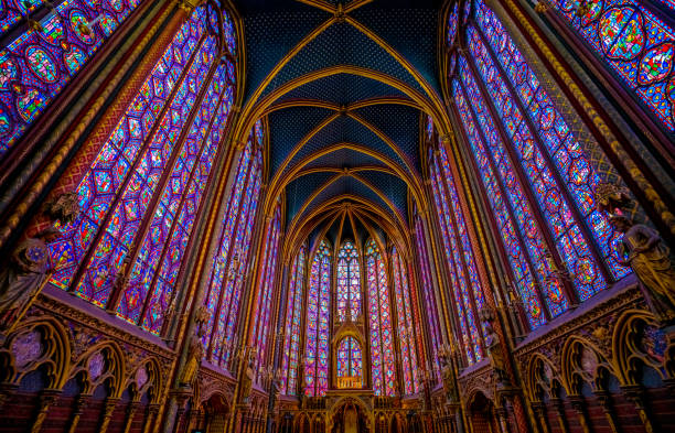 PARIS, FRANCE - MAY 17, 2018:The Sainte-Chapelle wonderful stain-glass windows one of the most visited landmark in Paris, France. Famous stained glass windows and ceiling.